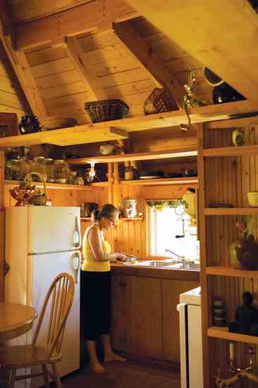 Tucked off the living space, the kitchen provides ample room for Denise to entertain.